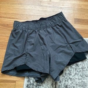 Grey Nike lined shorts with inner layer